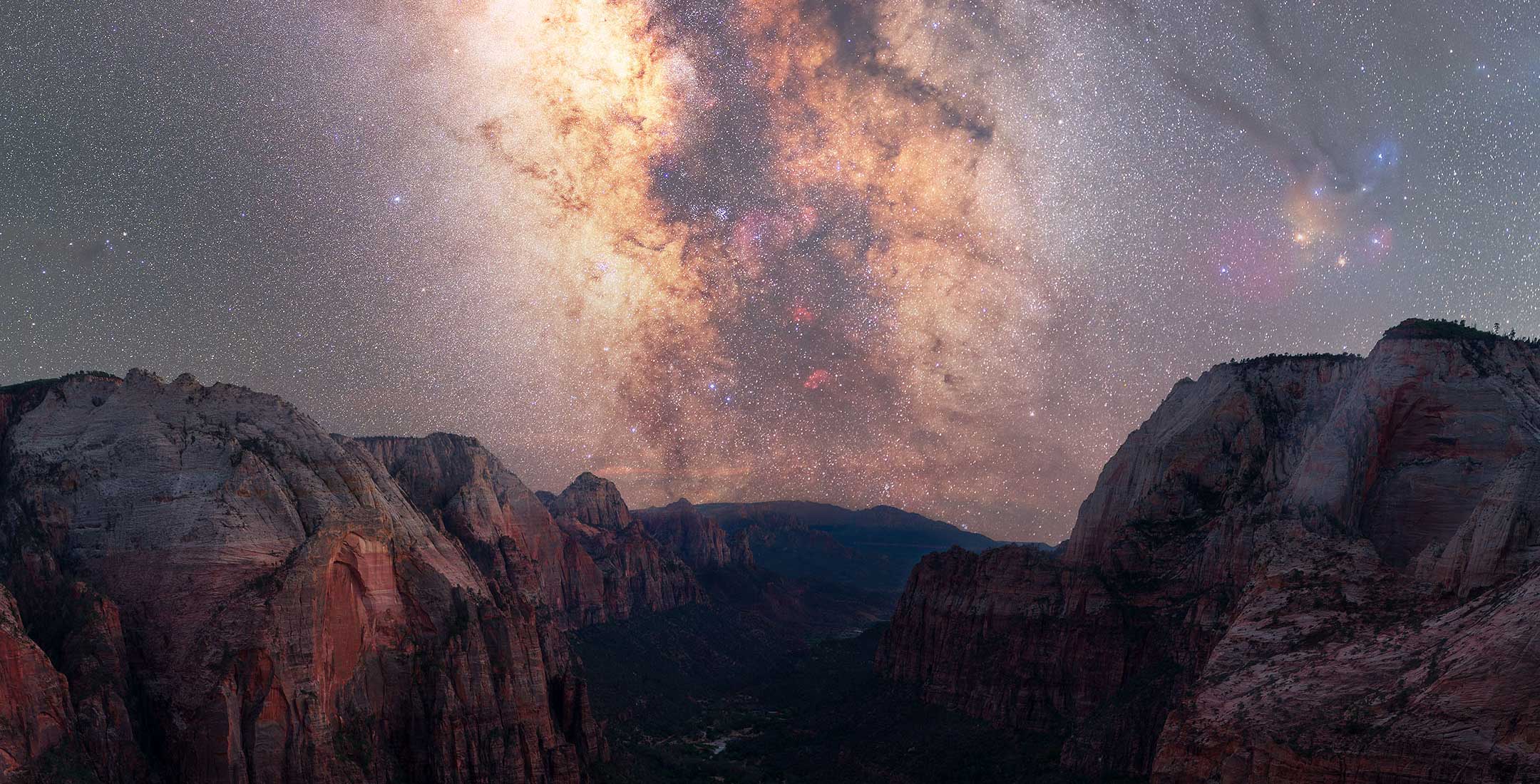 Milky Way over majestic canyon at night